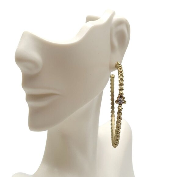 Gold Tone Textured Hoop Earrings With Rhinestone Flower Accents - Picture 1 of 7